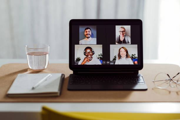 istock Teleconferencing at Home:  Empty Home Office With a Digital Tablet on the Desk 1359226954
