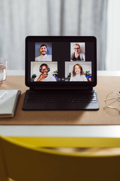 istock Teleconferencing at Home:  Empty Home Office With a Digital Tablet on the Desk 1359226958