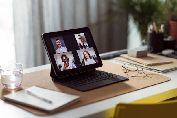 istock Teleconferencing at Home:  Empty Home Office With a Digital Tablet on the Desk 1359226962