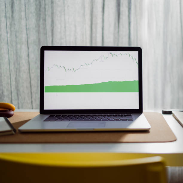 istock Working at Home:  Empty Home Office With a Laptop on the Desk 1359227147
