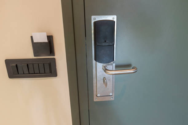 istock Close up view of digital door lock and holder for digital card keys with switch panel under. Greece. 1359231555