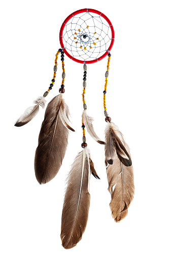 Dream Catcher, dream snare, Indian amulet that protects the sleeper from evil spirits and diseases, according to legend, bad dreams are entangled in a web, and good dreams slip through a hole in the middle, isolated on a white background