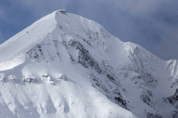 istock Alpine skiing at Big Sky, Montana 1359236060