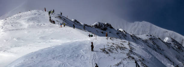 istock Alpine skiing at Big Sky, Montana 1359236867