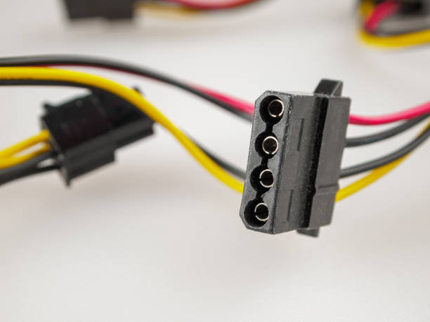 istock 4-pin power connector for all PATA hard disk drives and optical disk drives, peripherals and case fans, selective focus, plug 1359236878