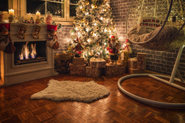 istock Decorated Christmas Tree Near Fireplace at Home 1359242803