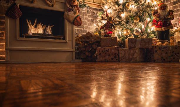 istock Decorated Christmas Tree Near Fireplace at Home 1359242807