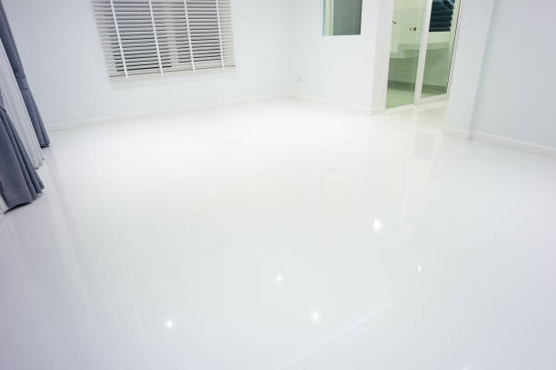 istock White empty room and tile floor in perspective view for background. 1359246847