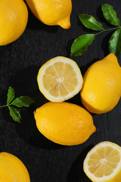 istock A yellow lemon against a black background. 1359249172