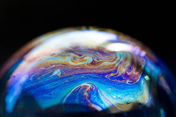 istock Abstract pattern, multicolored chaotic texture inside of the soap bubble, closeup 1359257880