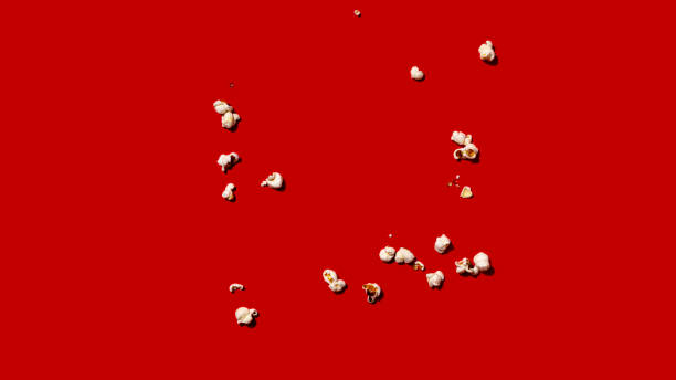 Popcorn on red background. stock photo