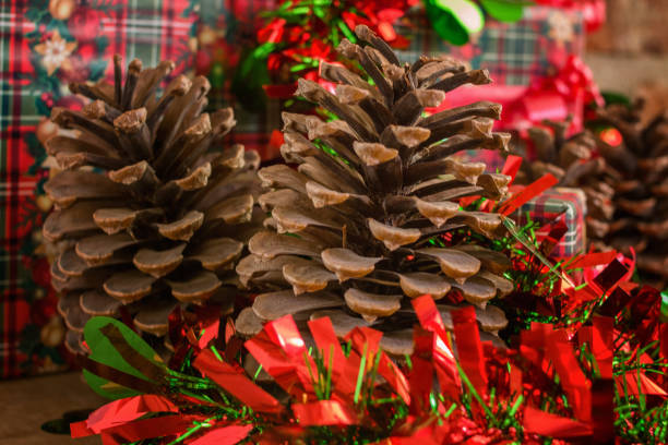 istock gifts, pinecones and Christmas decorations - closeup 1359258131