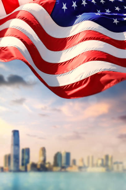 istock American flag and New Jersey skyline over sunset sky 1359269847