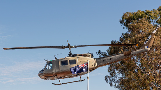 UH-1H Iroquois “Huey” Helicopter as used in the Vietnam War now on display at the free access public outdoor Vietnam War Memorial in Seymour in Central Victoria