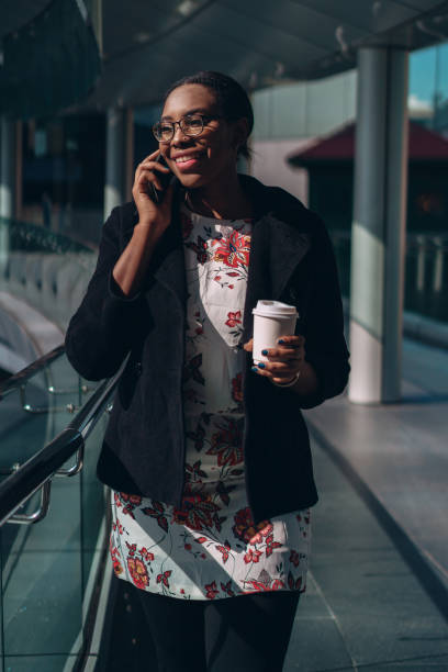 istock Businesswoman talking on a phone on a work break 1359274240