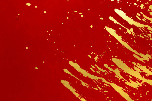 istock Red washi paper with gold splashes on a Japanese background. 1359275238