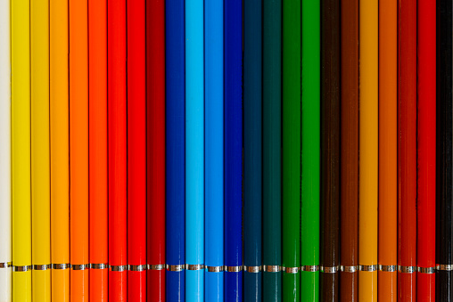 Multicolored pencils, colored pencils on white background.