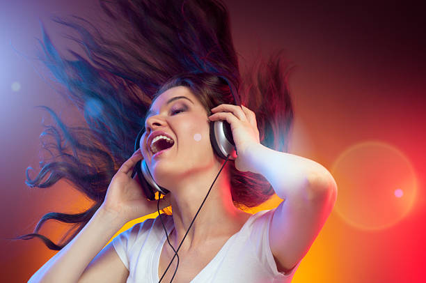 istock girl with headphones 135927759