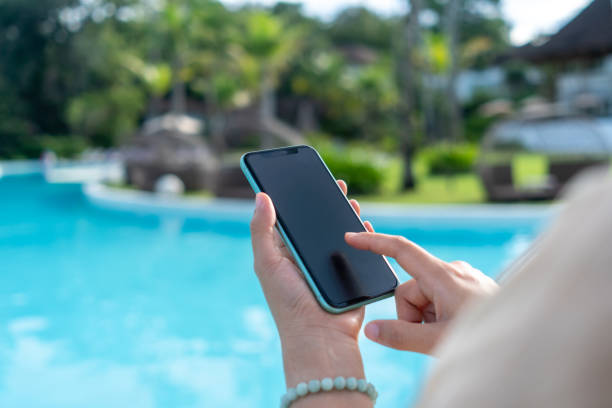 istock Woman hand using smartphone to do work business, social network, communication. 1359280273