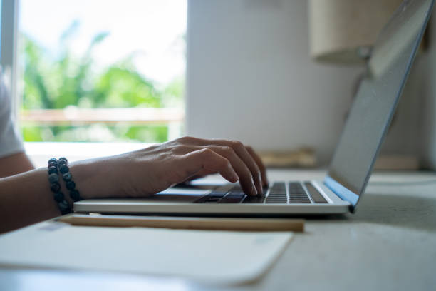 istock People using laptop to work study on work desk. Business, financial, trade stock maket and social network. 1359280341