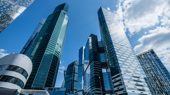 Inspiration of a cityscape. Modern skyscrapers under blue sky.