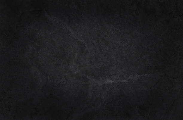 istock Dark gray black slate stone wall texture background in natural pattern for decorative interior and exterior. 1359286306