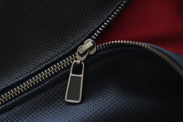 Closeup of zipper on blue leather jacket. Leather clothing repair concept