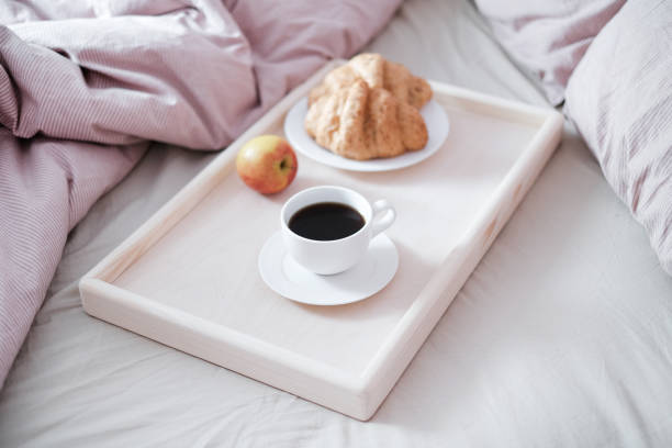 istock Breakfast on wooden table for bed. 1359291090