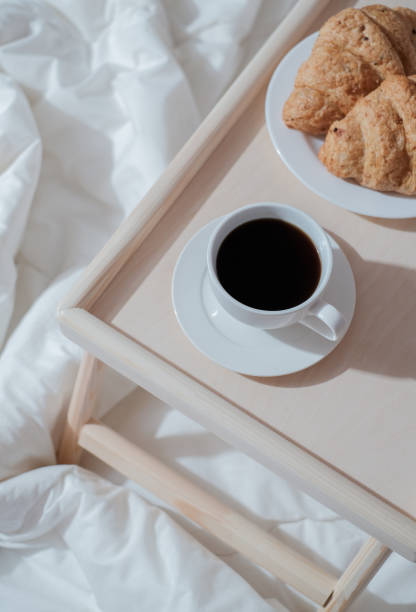 istock Breakfast on wooden table for bed. 1359291106