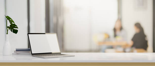 istock Laptop computer mockup and a copy space on a desk 1359296248