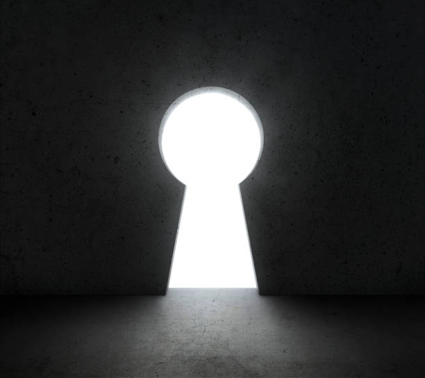 istock Front of bright big keyhole door, in a concrete wall 1359302154