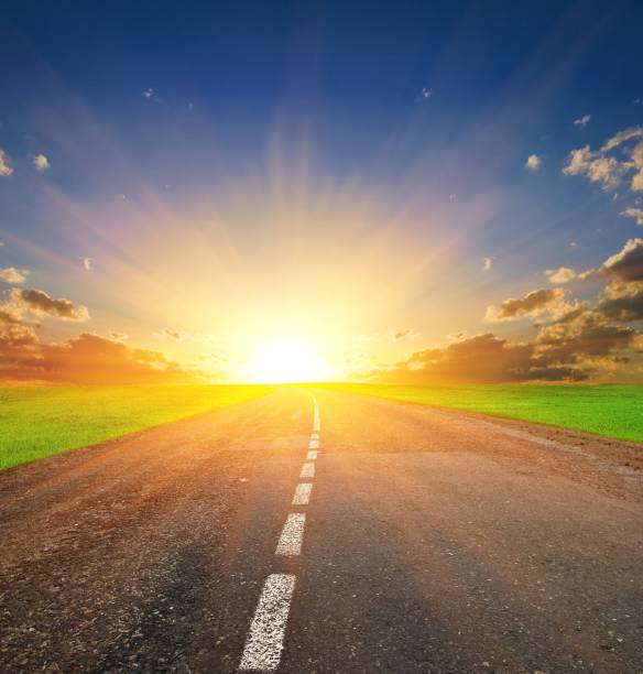 istock asphalt road at the sunset 1359305291