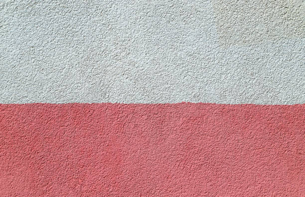 istock Texture of the decorative plasterwork painted in pink and white colors 1359308157