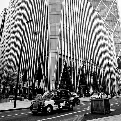 Central London UK November 21 2021, Contemporary Design Of The Nova Building Skyscraper In Victoria Street London With A Black Cab Passing And No People