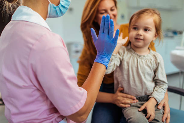 high-five! - nurse high five mask stock-fotos und bilder