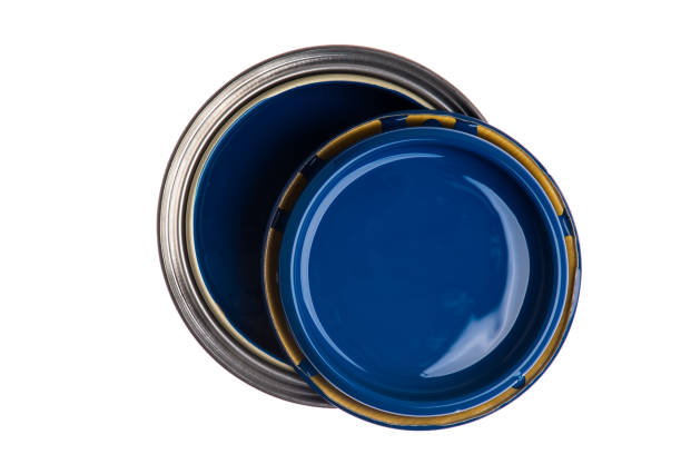 istock Opened blue can paint with lid top view isolated on white 1359314268