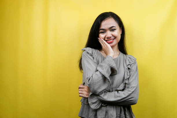 istock Beautiful young woman isolated 1359314880