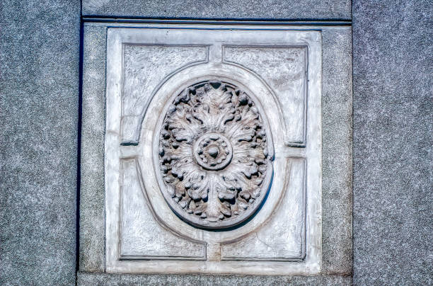 istock Traditional bas relief decoration at urban building. 1359315114