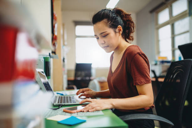 istock Modern business office with diverse entrepreneurs in Asia 1359321337