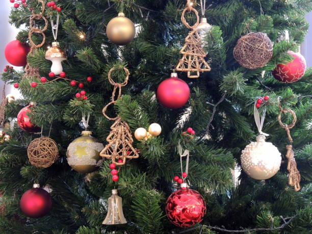 istock Christmas decoration on the green Christmas tree 1359322030