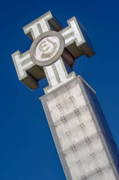 Bucharest, Romania - June 22, 2021: Shallow depth of field (selective focus) details with names of people who died in the Romanian Revolution from 1989 on a monument.
