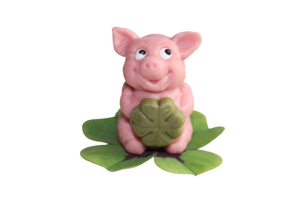 istock marzipan pig on lucky clover 1359326958