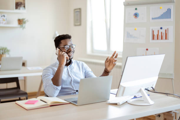 istock Businessman Making Phone Calls in His Office 1359327180