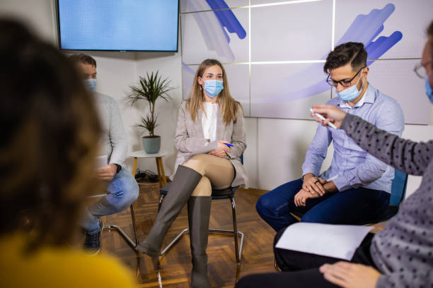 istock Press conference at media center during COVID-19 pandemic 1359329352