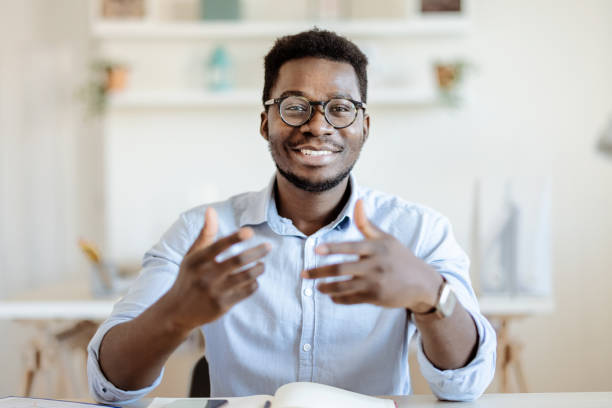 istock Male Manager holding Video Distant Job 1359330268