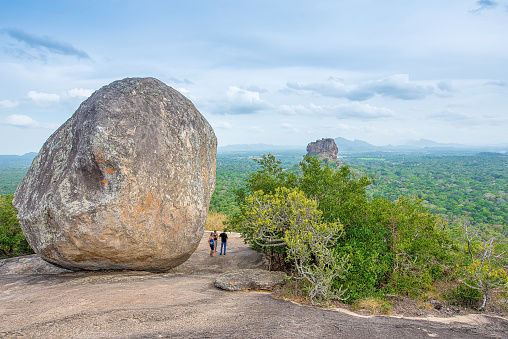 Sigiriya Rock, an ancient rock fortress, is a UNESCO World Heritage Site located in the northern Matale District near the town of Dambulla in Sri Lanka.  The rock is nearly 180 metres (600 feet) tall and is often considered as the Eighth Wonder of the World.