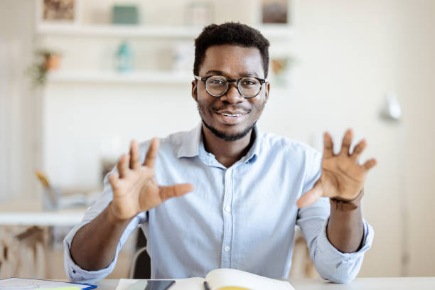 istock Male Manager holding Video Distant Job 1359330340