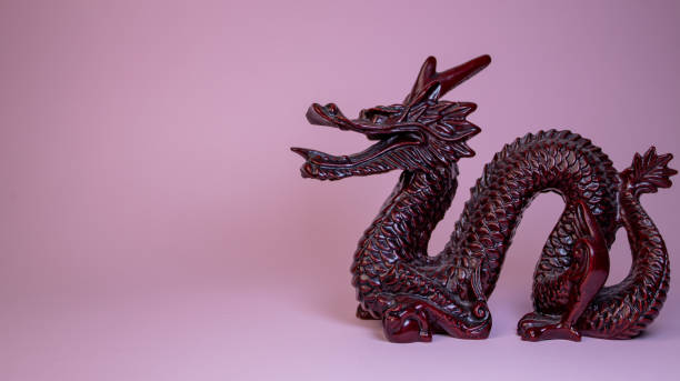 istock Chinese dragon figure on pink background 1359331657
