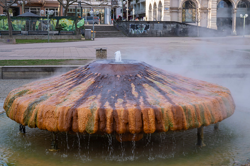 View of the steaming Kochbrunnen in Wiesbaden / Germany in winter