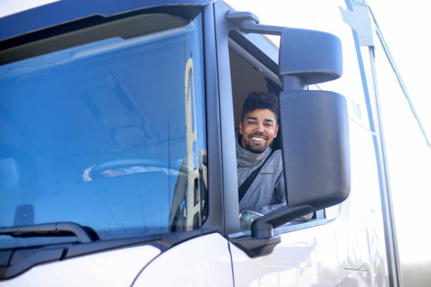 Smiling truck driver stock photo